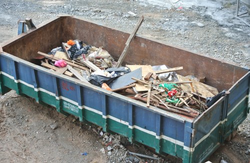 Skip hire service in action at a residential site